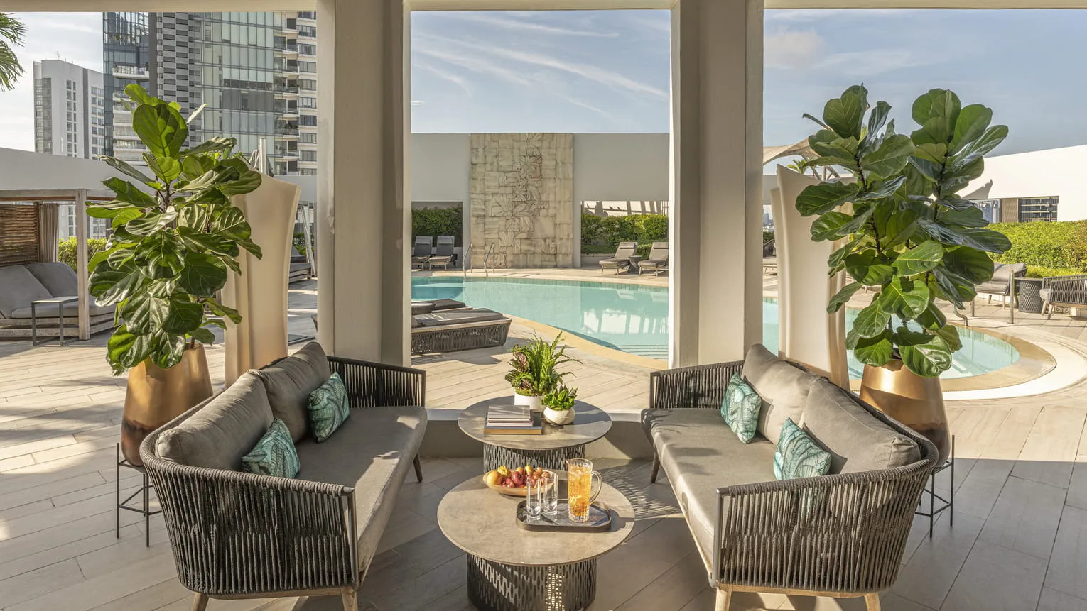 Four Seasons Singapore rooftop pool family-friendly with towel service